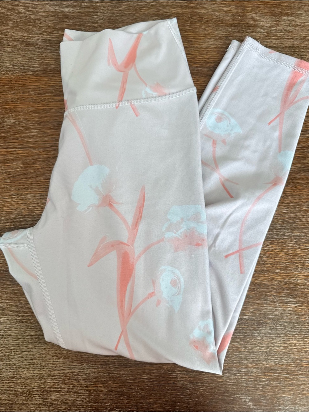 Fabletics Light Pink Floral Leggings with Coral and Pale Blue Accents